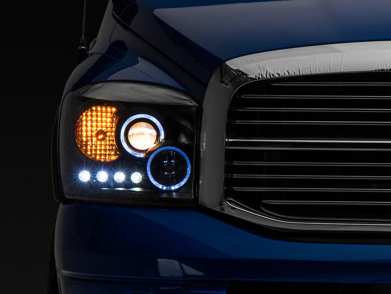 Phares de projecteur à LED Raxiom 06-08 Dodge RAM 1500 - Boîtier noir (lentille transparente)