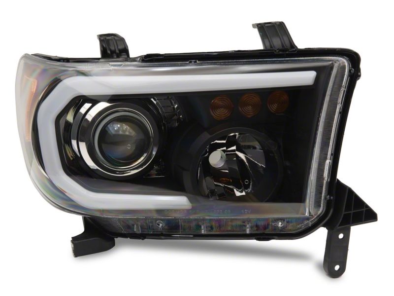 Phares de projecteur axiaux Raxiom 07-13 Toyota Tundra avec barre LED SEQL - Boîtier noir (lentille transparente)