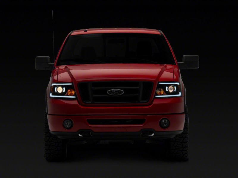 Phares de projecteur Raxiom 04-08 Ford F-150 série axiale avec barre LED SEQL - boîtier noir (lentille transparente)