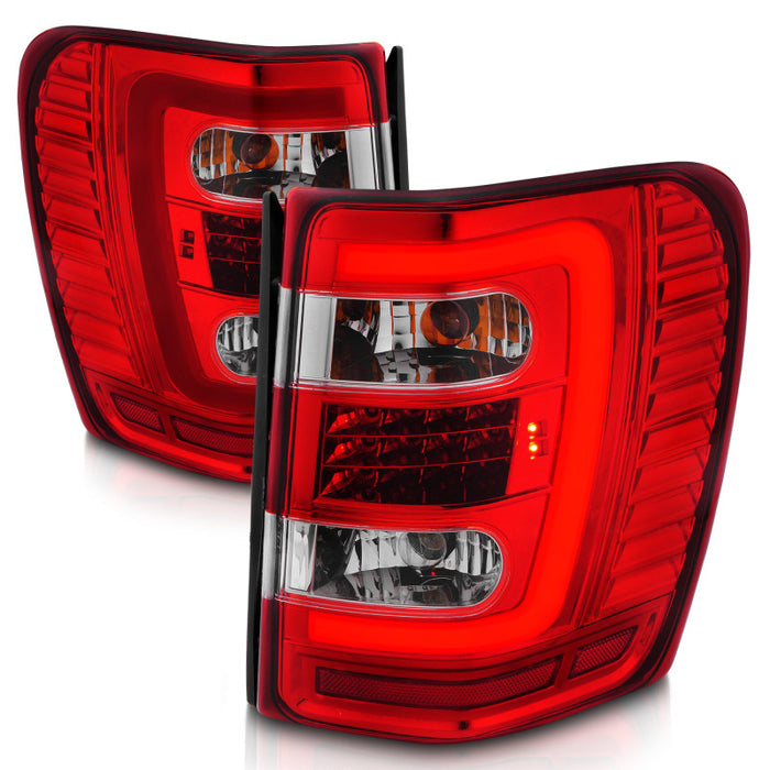 Feux arrière à LED ANZO 1999-2004 Jeep Grand Cherokee avec barre lumineuse, boîtier chromé, lentille rouge/transparente