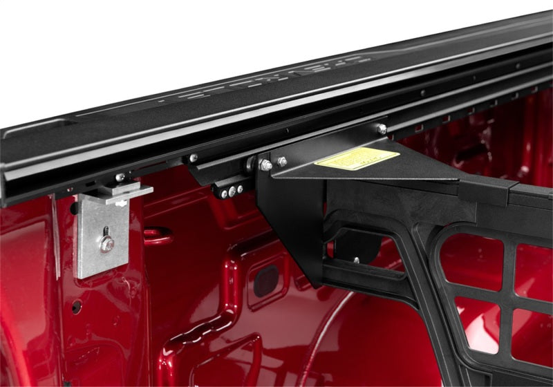 Roll-N-Lock 07-13 Chevy Silverado/Sierra avec capuchons de rail d'origine LB 96-1/4 po Cargo Manager