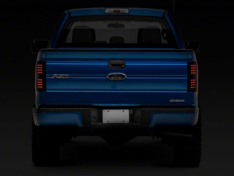 Feux arrière à LED Raxiom 09-14 Ford F-150 Styleside Axial Series - Boîtier noir (lentille fumée)