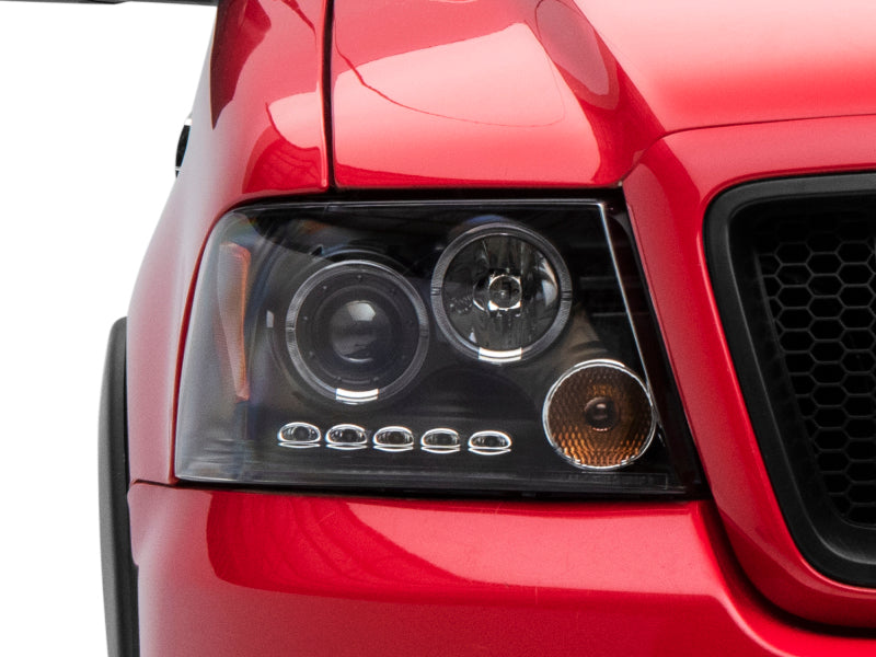 Phares de projecteur à double LED Raxiom 04-08 Ford F-150 - Boîtier noir (lentille transparente)