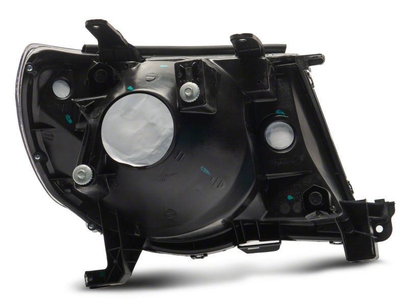 Phares de rechange d'origine Raxiom 05-11 Toyota Tacoma Axial Series - Boîtier noir (lentille transparente)