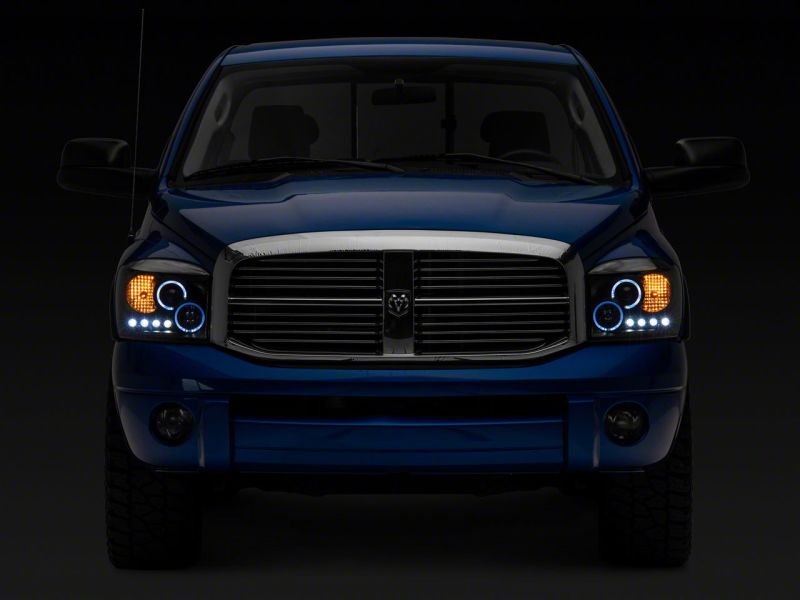 Phares de projecteur à LED Raxiom 06-08 Dodge RAM 1500 - Boîtier noir (lentille transparente)