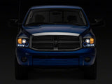 Raxiom 06-08 Dodge RAM 1500 LED Halo Projector Headlights- Blk Housing (Clear Lens)
