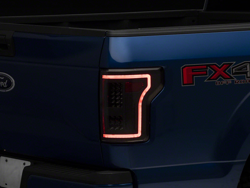 Feux arrière à LED Raxiom 15-17 Ford F-150 avec clignotants SEQL - Boîtier noir (lentille transparente)