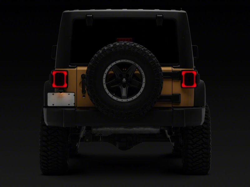 Feux arrière à LED Raxiom 07-18 Jeep Wrangler JK Axial Series - Boîtier noir (lentille fumée)