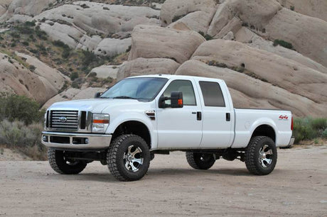 Système budgétaire Fabtech 08-16 Ford F250/350/450 4WD 8 Lug 4in avec amortisseurs de performance