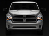 Raxiom 09-18 Dodge RAM 1500/2500/3500 Axial Headlights w/ SEQL LED Bar- Blk Housing (Clear Lens)