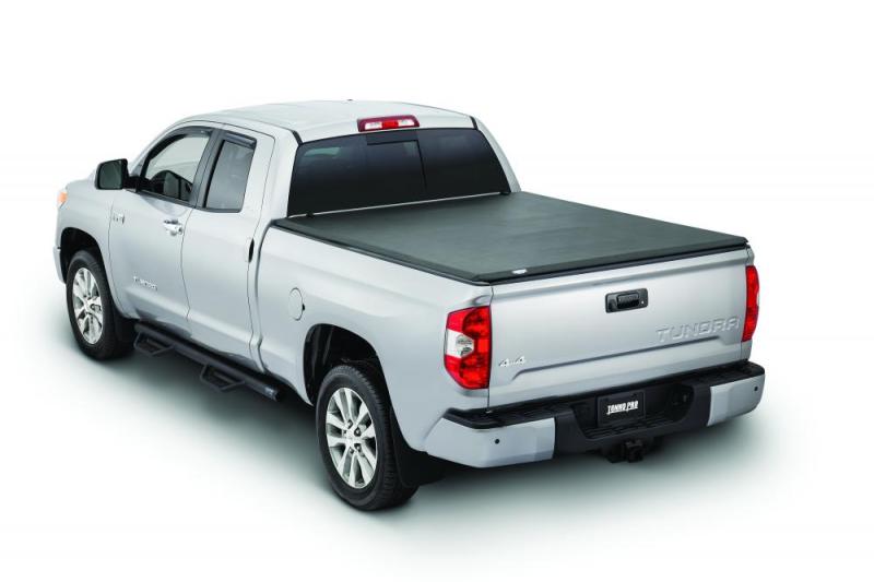 Tonno Pro 04-15 Nissan Titan 6,7 pieds (avec kit de chenilles utilitaires 42-498) Couvre-tonneau pliable en trois parties Tonno Fold