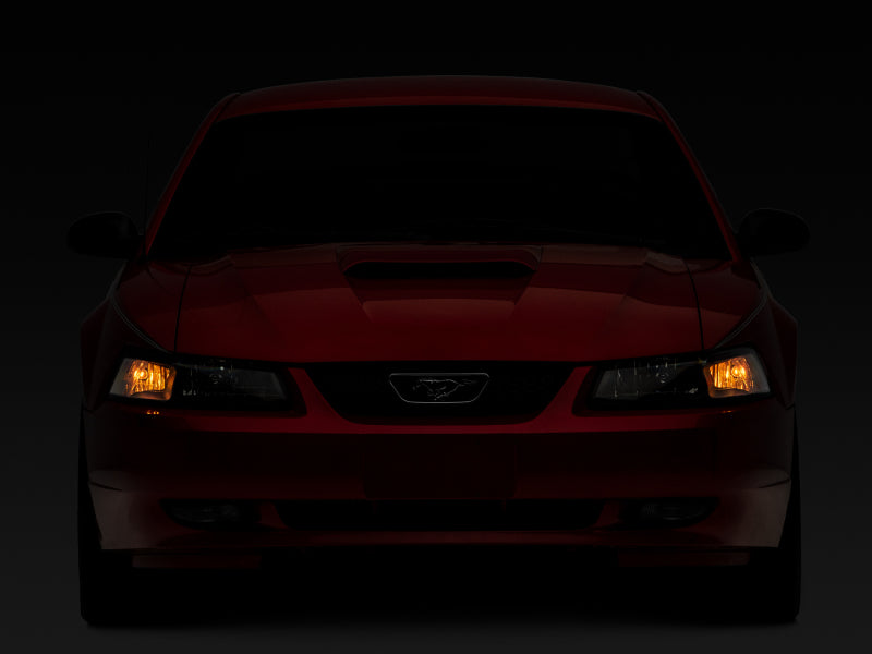 Phares de rechange de style OEM Raxiom Mustang Axial Series 99-04 - Boîtier noir (lentille transparente)