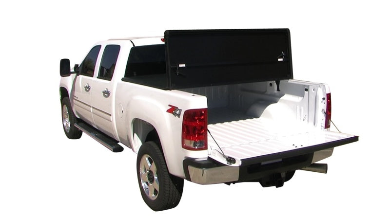 Tonno Pro 04-15 Nissan Titan 5,5 pieds (avec kit de chenilles utilitaires 42-498) Couvre-caisse rigide pliable