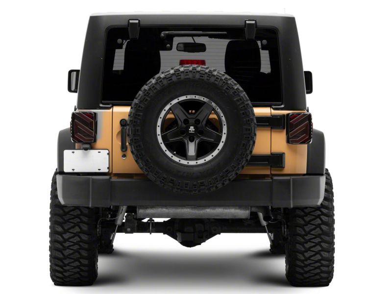 Feux arrière à LED Raxiom 07-18 Jeep Wrangler JK Axial Series Trident - Boîtier noir (lentille transparente)