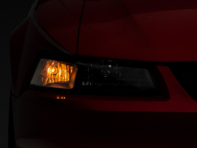 Phares de rechange de style OEM Raxiom Mustang Axial Series 99-04 - Boîtier noir (lentille transparente)