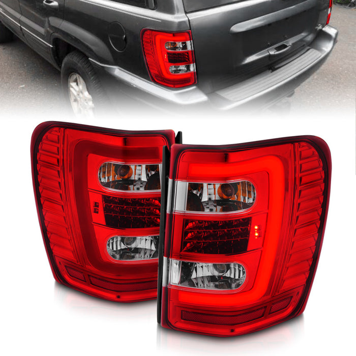 Feux arrière à LED ANZO 1999-2004 Jeep Grand Cherokee avec barre lumineuse, boîtier chromé, lentille rouge/transparente