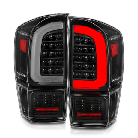 Feux arrière à LED ANZO 16-21 Toyota Tacoma - avec barre lumineuse séquentielle, boîtier noir et lentille transparente