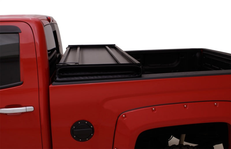 Lund 09-14 Ford F-150 Styleside (6.5ft. Bed) Hard Fold Tonneau Cover - Black