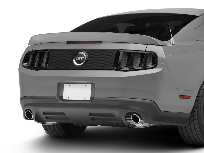 Feux arrière à LED Raxiom 10-12 Ford Mustang Vector V2 - Boîtier noir brillant (lentille transparente)