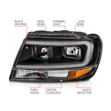 Phares en cristal ANZO 99-04 Jeep Grand Cherokee - avec boîtier noir à barre lumineuse