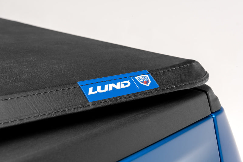 Lund 04-08 Ford F-150 (6.5ft. Bed) Genesis Tri-Fold Tonneau Cover - Black