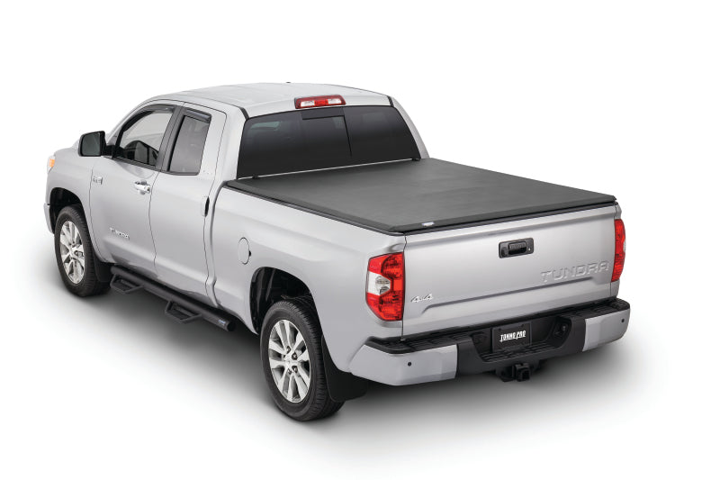 Tonno Pro 04-15 Nissan Titan 6,7 pieds (avec kit de chenilles utilitaires 42-498) Couvre-tonneau pliable en trois parties Tonno Fold