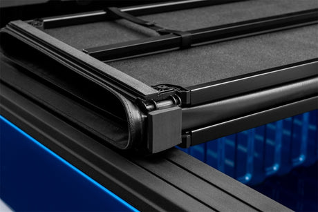 Lund 19-23 Dodge Ram 1500 5,7 pi (sans RamBox) Tonneau rigide pliable Lund - Noir