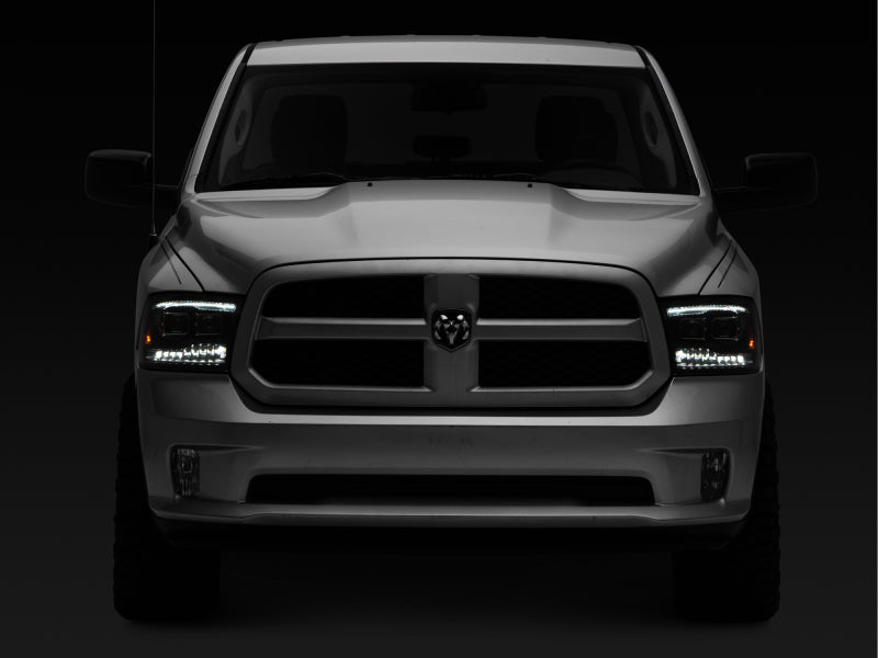 Raxiom 09-18 RAM 1500 LED Projector Headlights w/ Switchback Turn Signals- Blk Housing (Clear Lens)