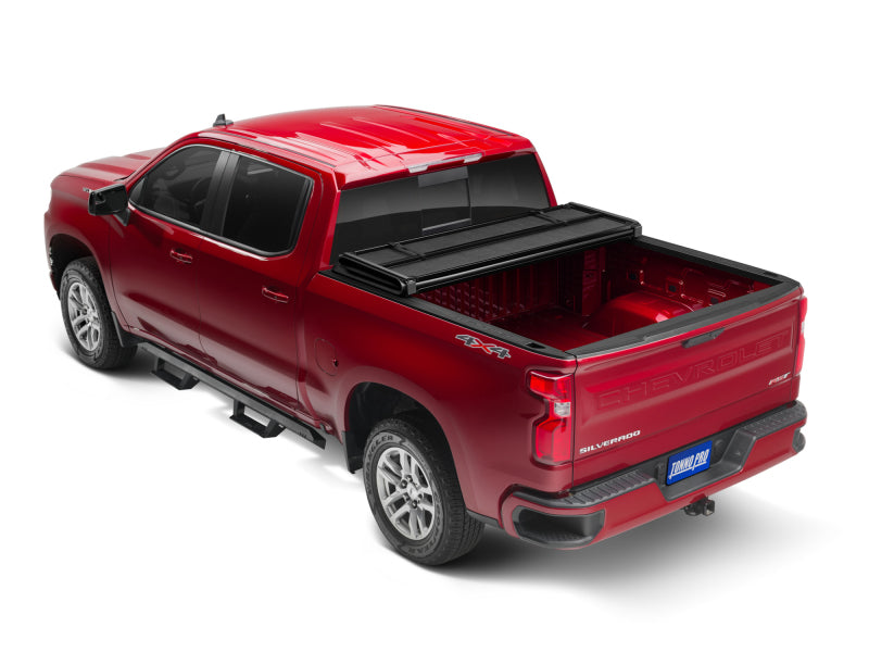 Tonno Pro 04-15 Nissan Titan (avec kit de serrage pour système de chenilles) Couvre-caisse rigide pliable de 6 pi 7 po