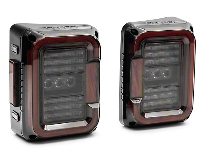 Feux arrière à LED Raxiom 07-18 Jeep Wrangler JK Axial Series - Boîtier noir (lentille fumée foncée)