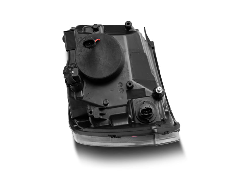 Phares de projecteur à LED Raxiom 09-18 RAM 1500 Super White Halo - Boîtier noir (lentille transparente)