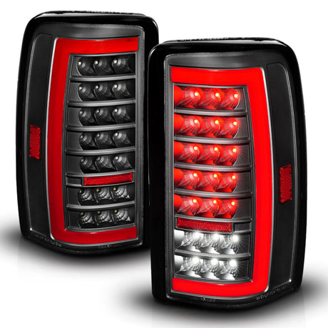 Feux arrière à LED ANZO 00-06 Chevrolet Tahoe / GMC Yukon avec barre lumineuse, boîtier noir/lentille transparente