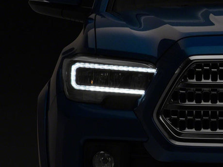 Raxiom 16-23 Toyota Tacoma avec phares halogènes DRL à LED d'usine - Boîtier noir (lentille transparente)
