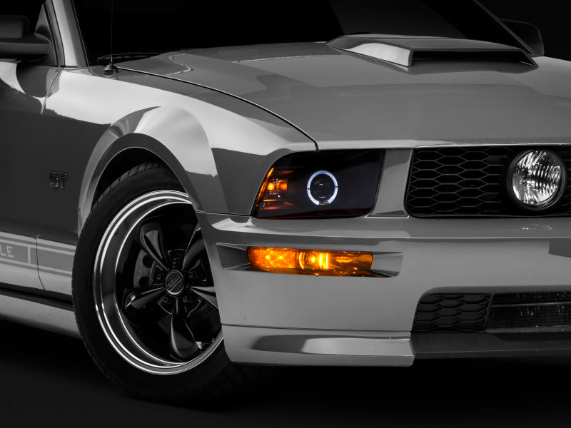 Phares halogènes à DEL de style 2010 de Raxiom 05-09 pour Ford Mustang - Noir Hsng (lentille transparente/à l'exclusion du GT500)