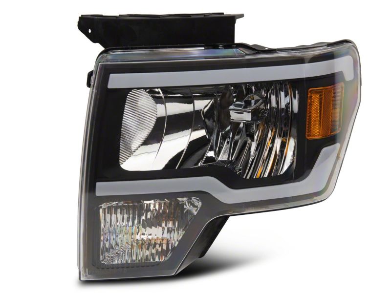 Raxiom 09-14 Ford F-150 Axial Series Headlight w/ SEQL LED Bar- Blk Housing (Clear Lens)