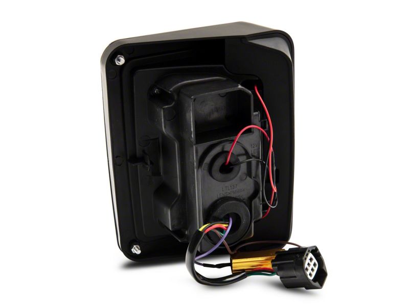 Feux arrière à LED Raxiom 07-18 Jeep Wrangler JK Axial Series - Boîtier noir (lentille transparente)