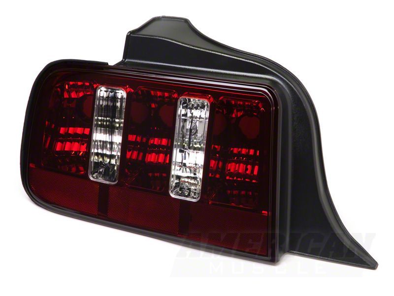 Feux arrière Raxiom 05-09 Ford Mustang Coyote - Boîtier noir (lentille fumée)