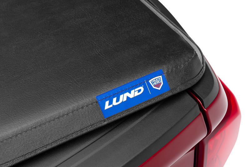 Lund 04-08 Ford F-150 Styleside (5.5ft. Bed) Hard Fold Tonneau Cover - Black