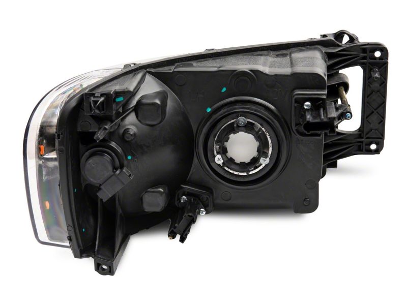 Phares de style OEM Raxiom 02-05 Dodge RAM 1500 Axial Series - Boîtier chromé (lentille transparente)