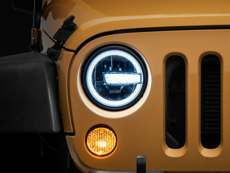 Phares à LED Raxiom 97-18 Jeep Wrangler TJ/JK 7 pouces avec halos - Boîtier noir (lentille transparente)