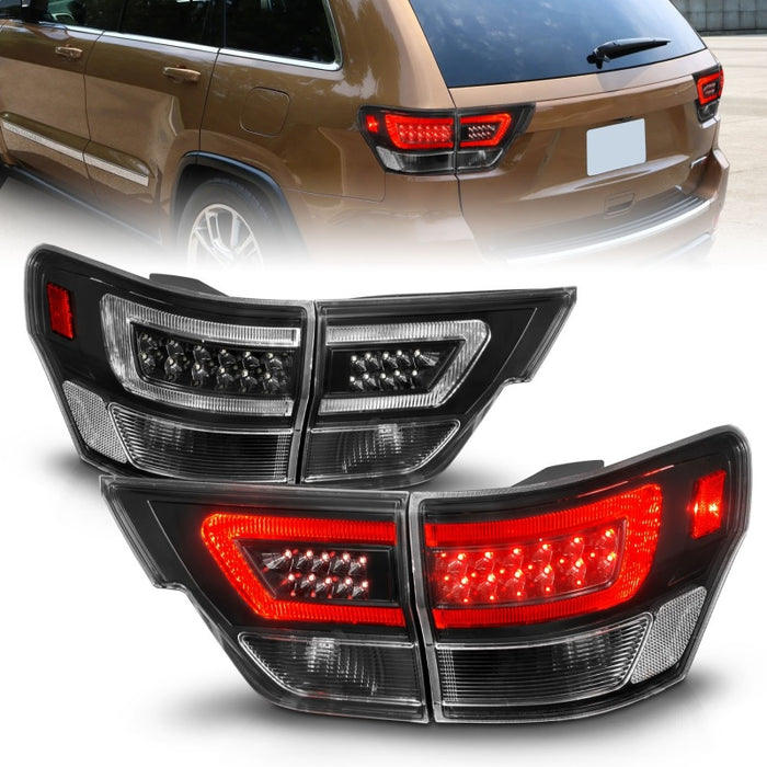 Feux arrière à LED ANZO 11-13 Jeep Grand Cherokee avec barre lumineuse Boîtier noir/lentille transparente 4 pièces