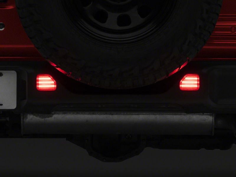 Raxiom 18-23 Jeep Wrangler JL Moab Rubicon Sahara Axial LED Rear Bumper Reflector Lights- Clear