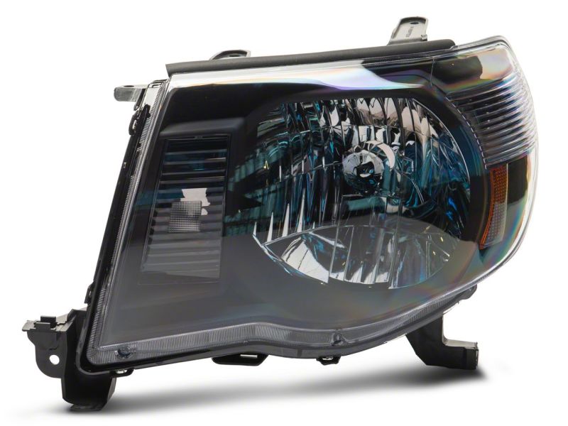 Phares de rechange d'origine Raxiom 05-11 Toyota Tacoma Axial Series - Boîtier noir (lentille transparente)