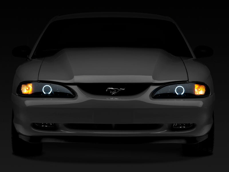 Raxiom 94-98 Ford Mustang LED Halo Projector Headlights- Black Housing (Smoked Lens)