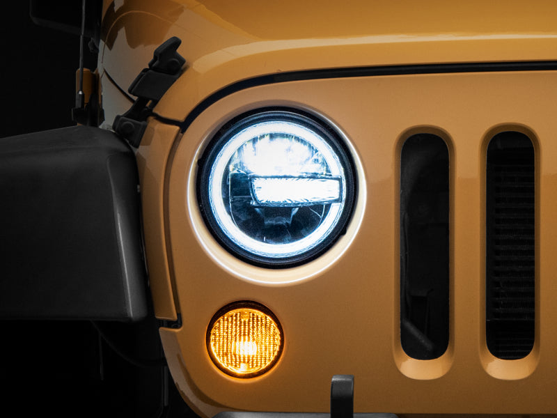 Phares à LED Raxiom 97-18 Jeep Wrangler TJ/JK 7 pouces avec halos - Boîtier noir (lentille transparente)