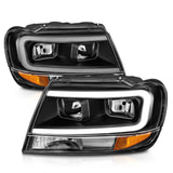 Phares en cristal ANZO 99-04 Jeep Grand Cherokee - avec boîtier noir à barre lumineuse