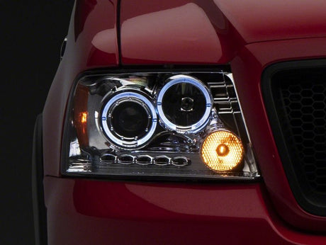 Phares de projecteur à double LED Raxiom 04-08 Ford F-150 - Boîtier chromé (lentille transparente)