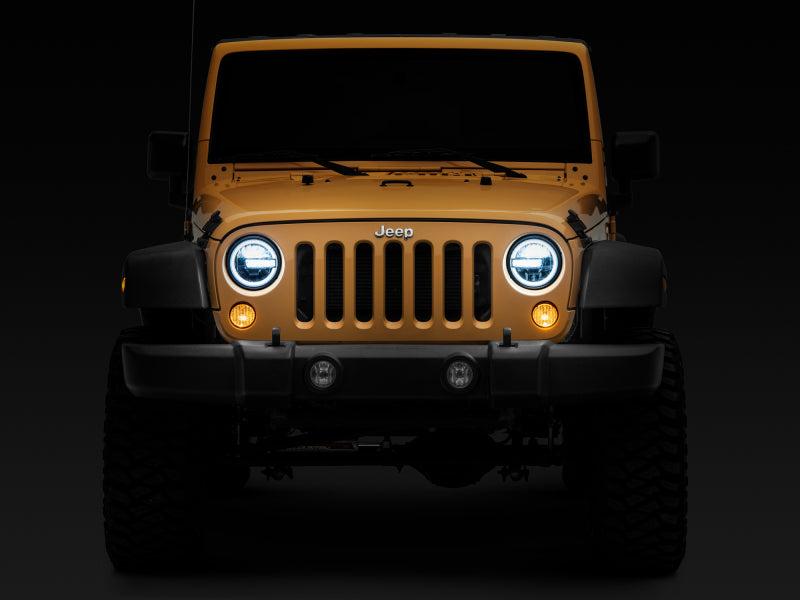 Phares à LED Raxiom 97-18 Jeep Wrangler TJ/JK 7 pouces avec halos - Boîtier noir (lentille transparente)