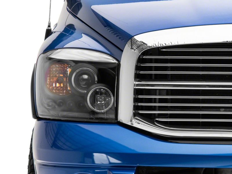 Phares de projecteur à LED Raxiom 06-08 Dodge RAM 1500 - Boîtier noir (lentille transparente)