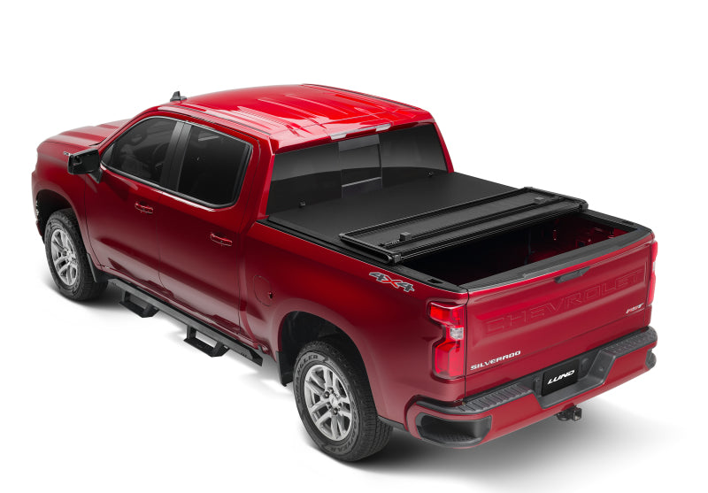 Lund 07-13 Toyota Tundra Fleetside (5.5ft. Bed) Hard Fold Tonneau Cover - Black